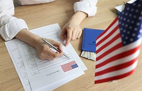 Cliente inversionista iniciando el proceso de solicitud de visa E-2